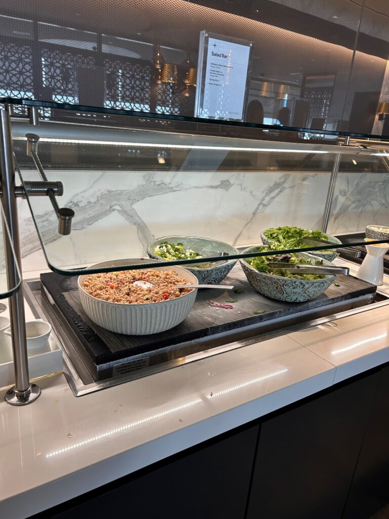 a buffet with bowls of food