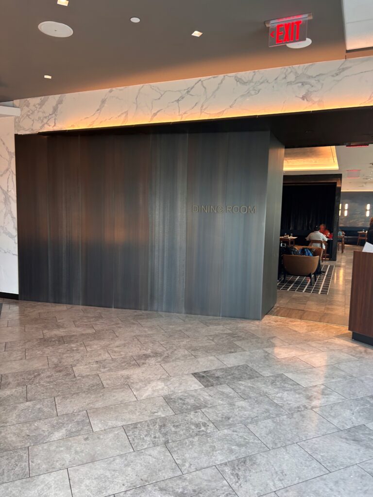a room with a marble floor and a marble wall