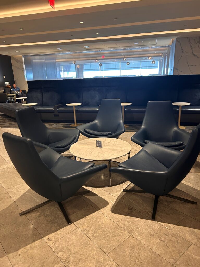 a group of chairs around a table