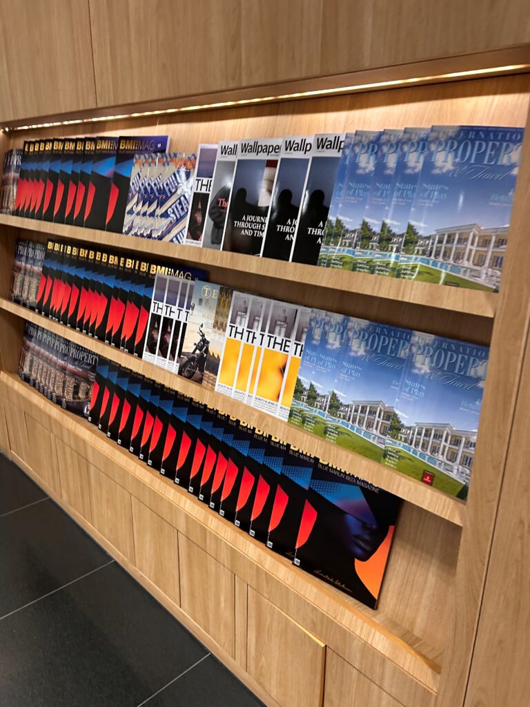 a shelf with magazines on it
