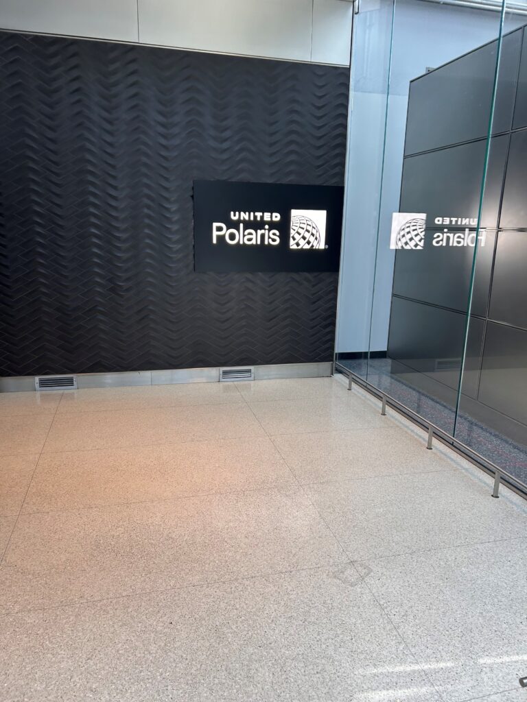 a black wall with white text on it
