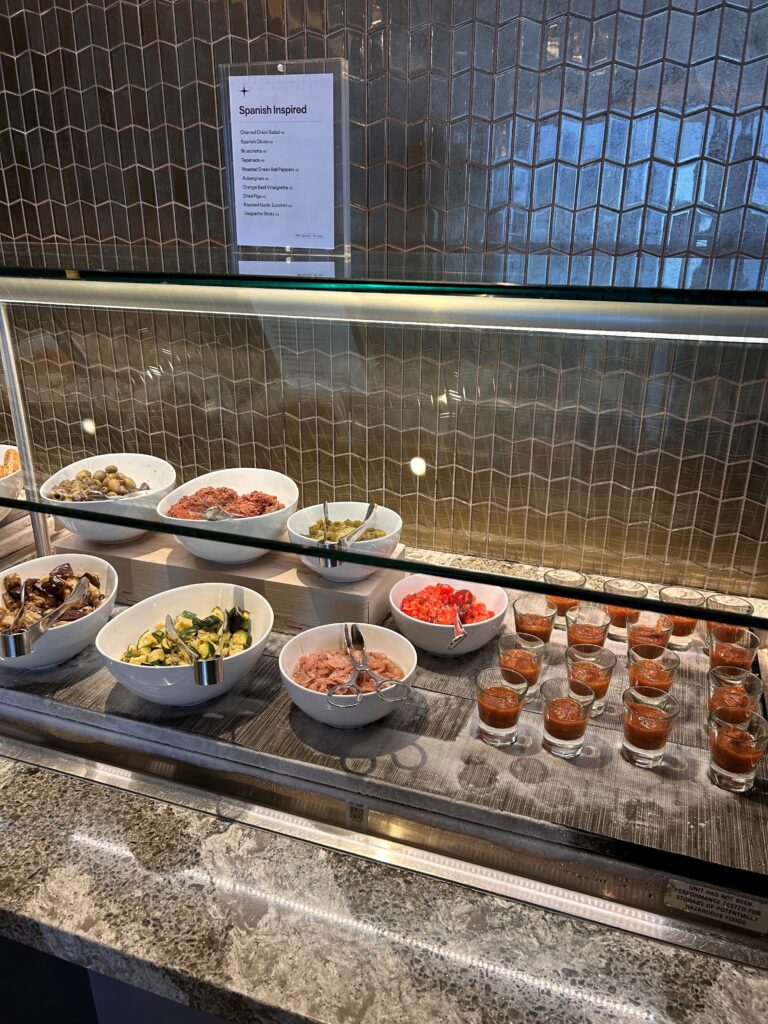 a display case with bowls of food