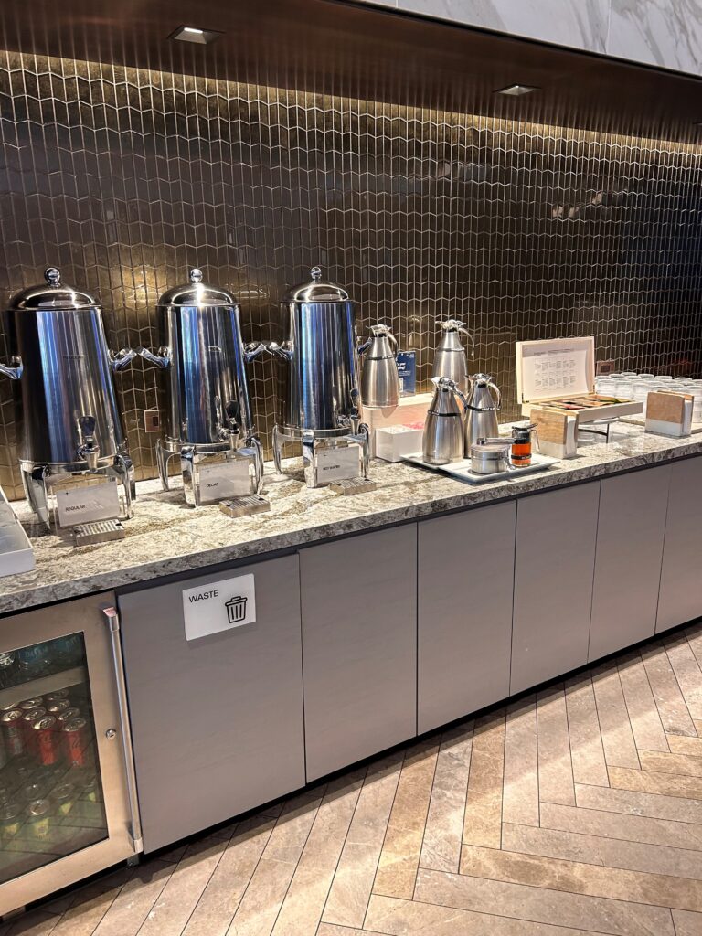 a group of silver containers on a counter