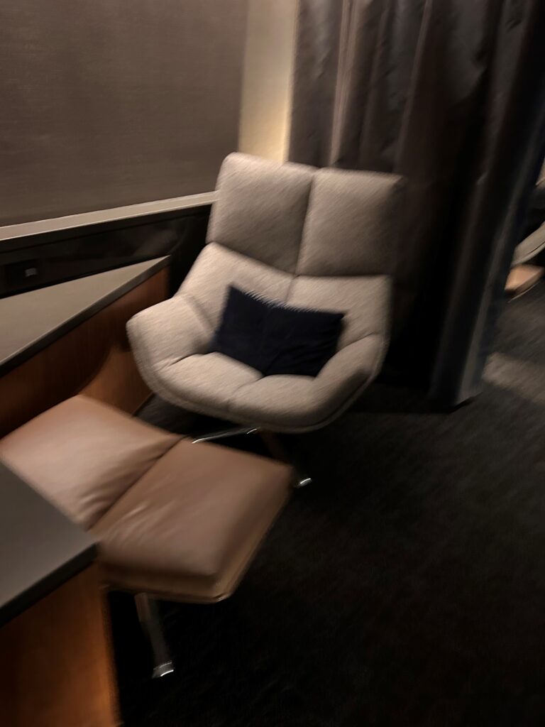 a chair next to a table