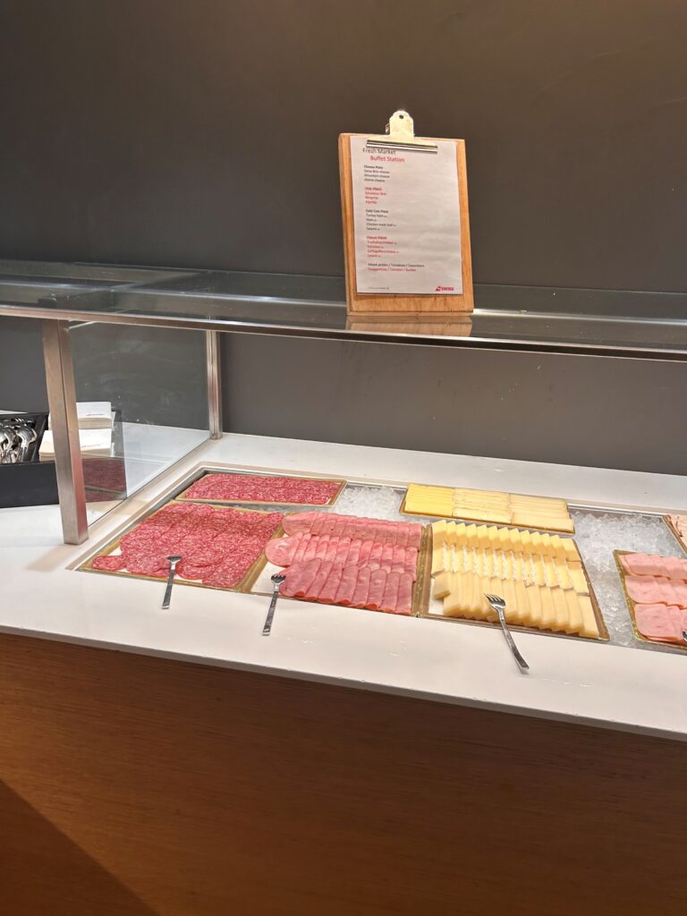 a display of meats on a counter