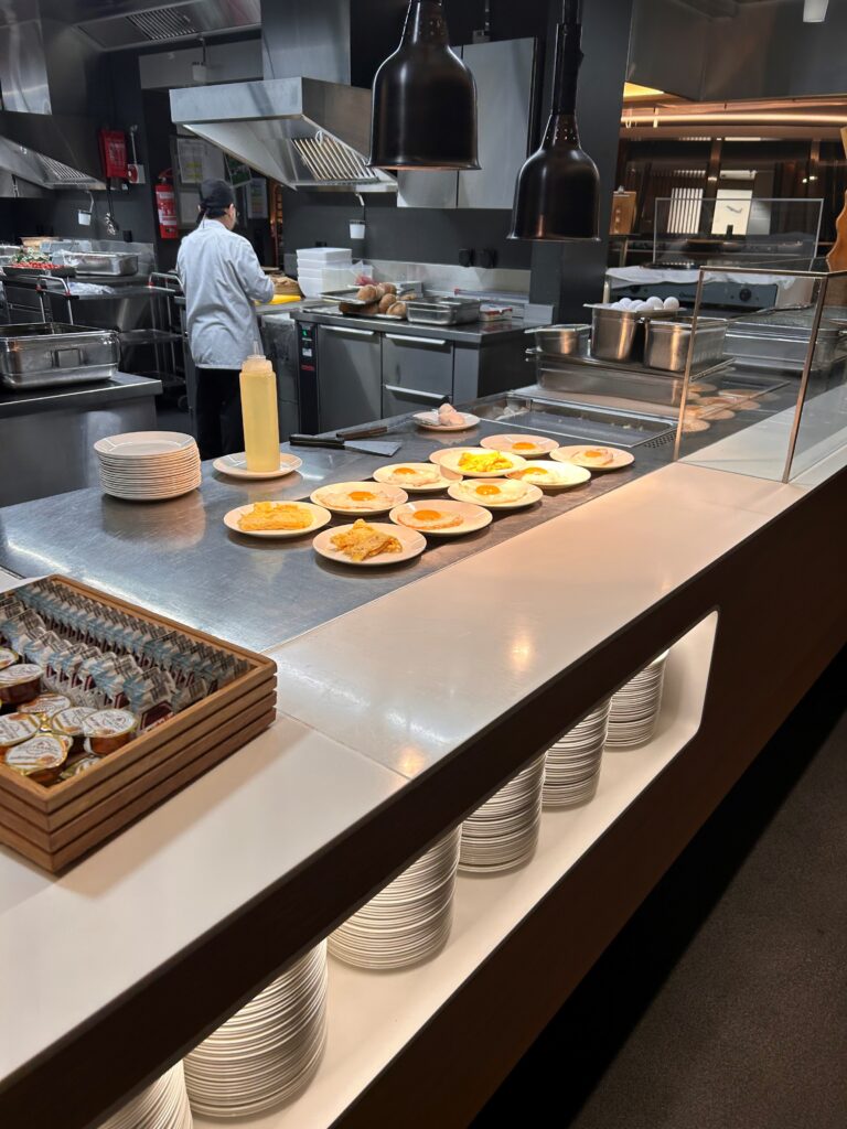 a kitchen with plates of food
