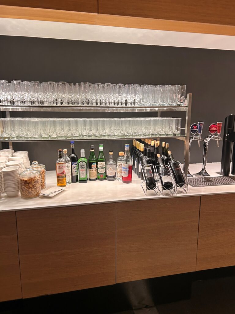 a bar with bottles and glasses