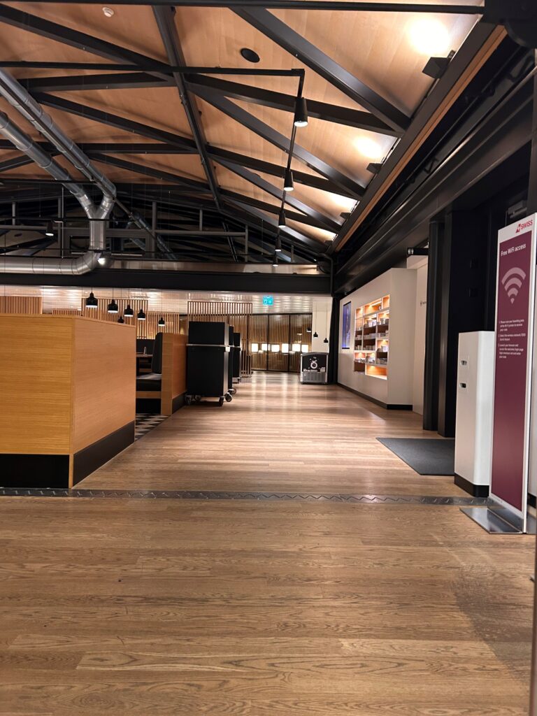 a large room with wood floors and a wood floor