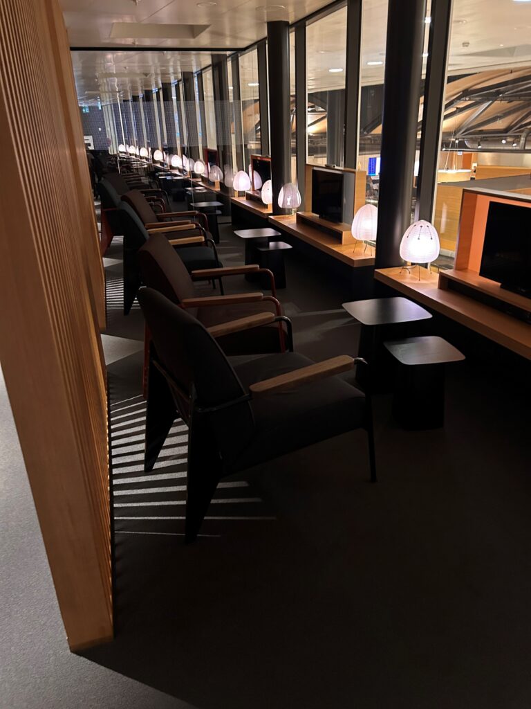 a row of chairs and a television