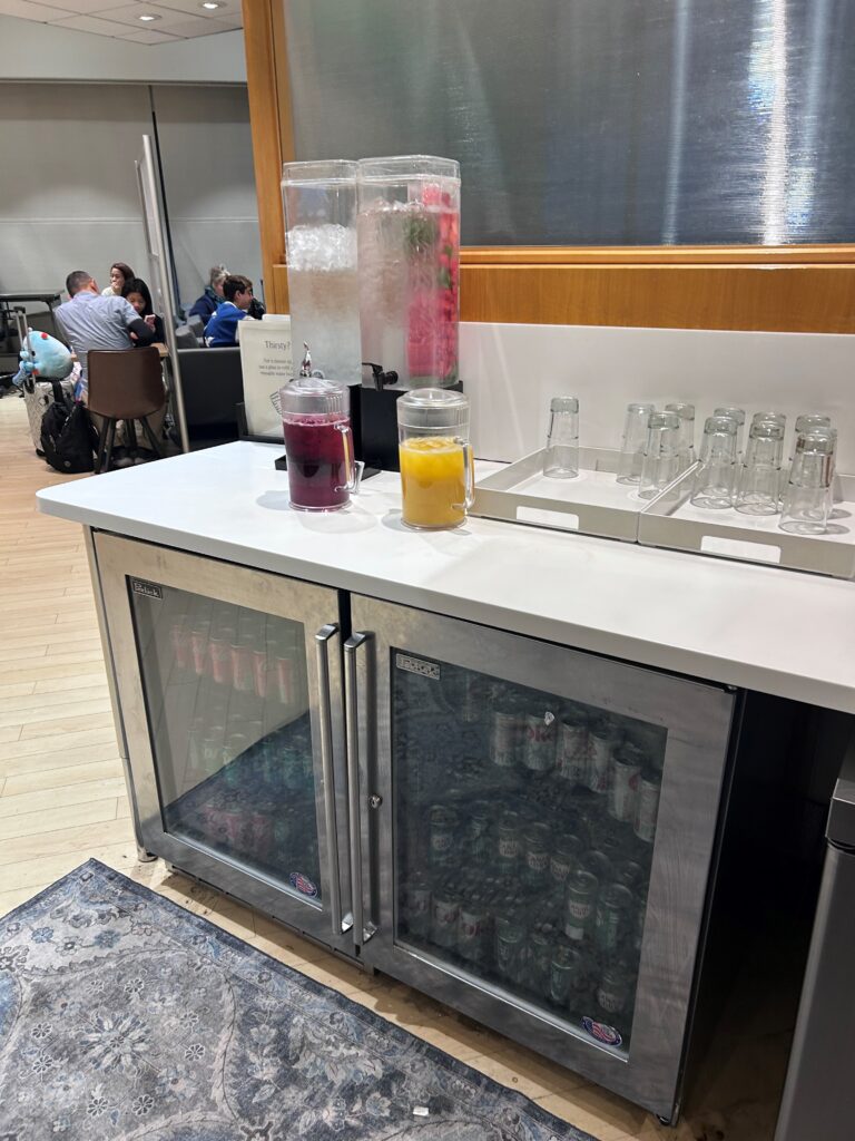 a refrigerated cooler with drinks on it