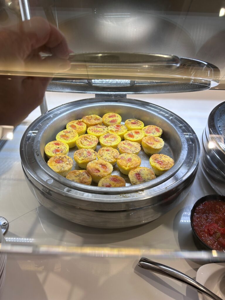 a bowl of food in a glass case