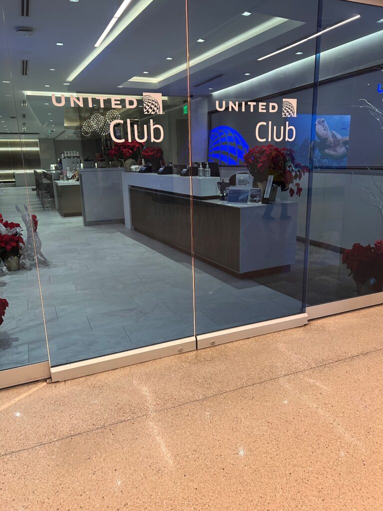 a glass wall with a sign on it