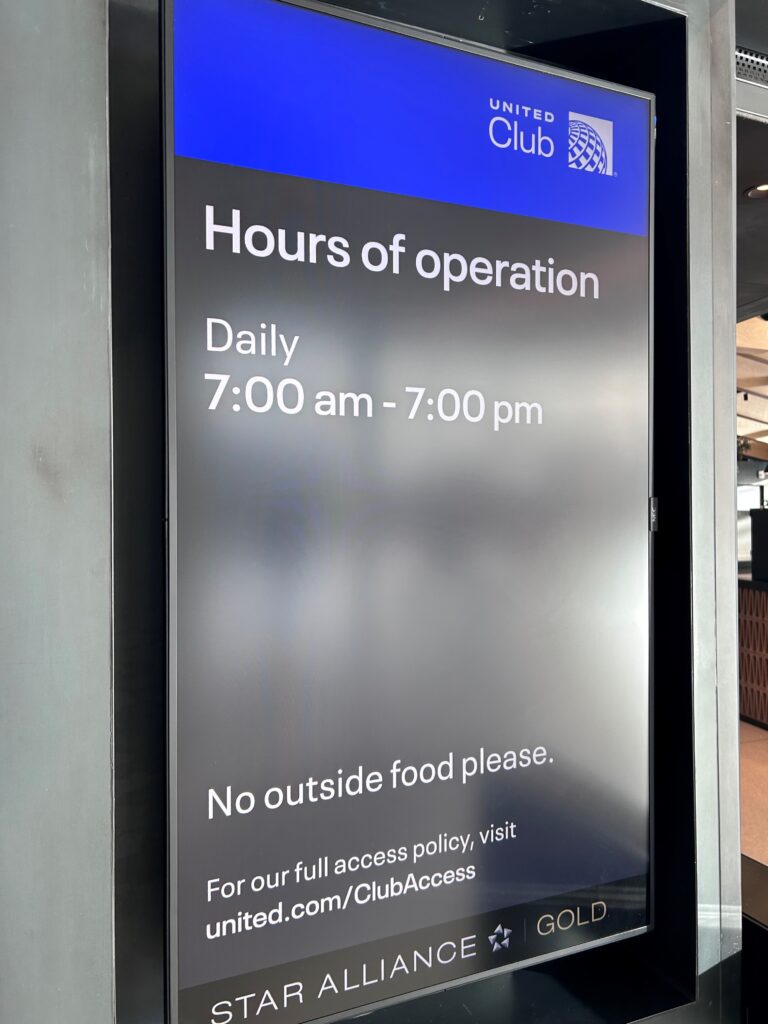 a sign with a blue and white sign