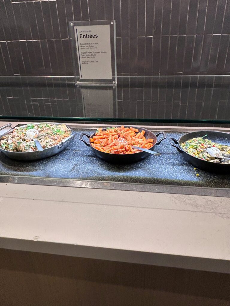 a group of bowls of food on a counter