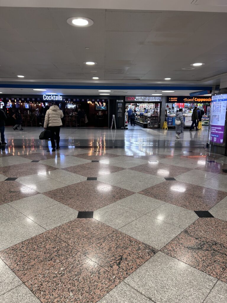 people walking in a large hall