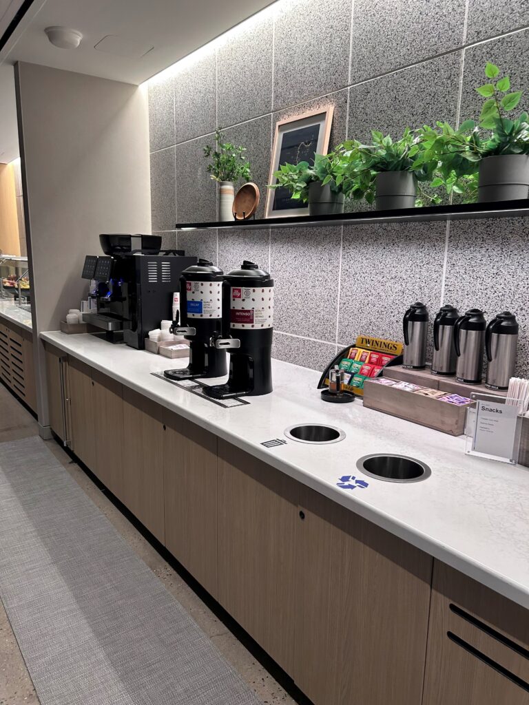 a coffee machine and coffee maker on a counter