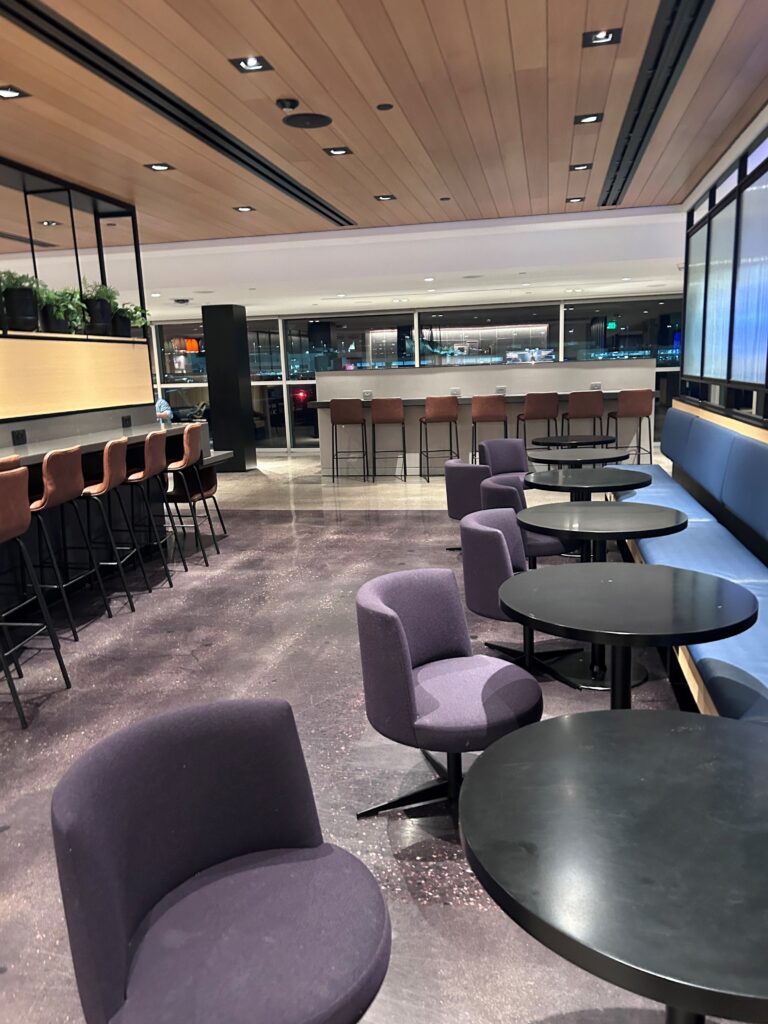 a room with tables and chairs