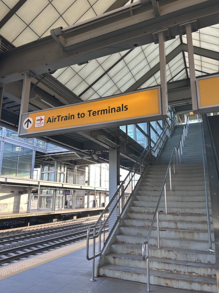 a sign above a staircase