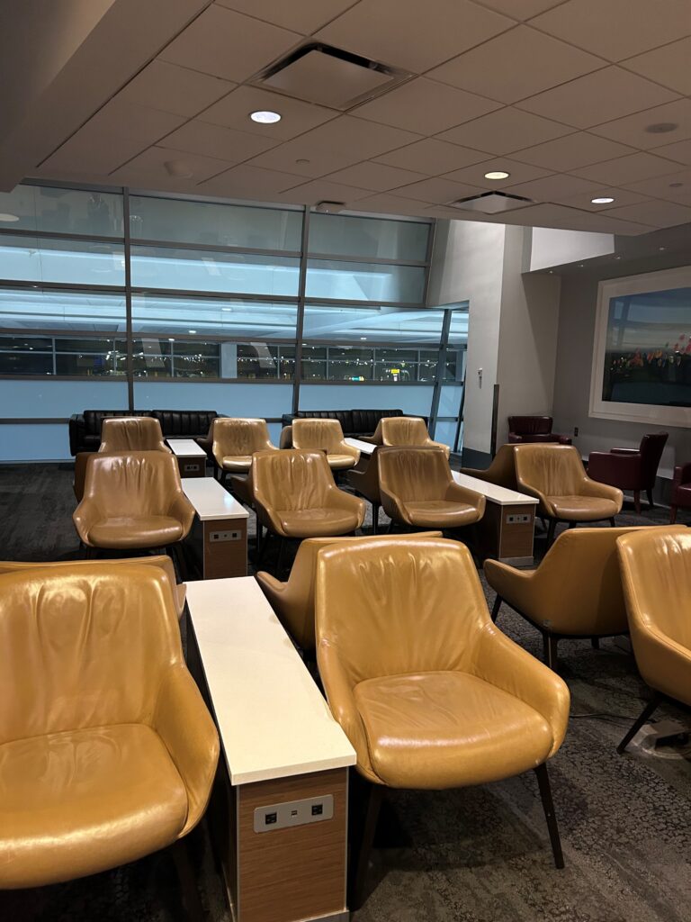 a room with chairs and tables