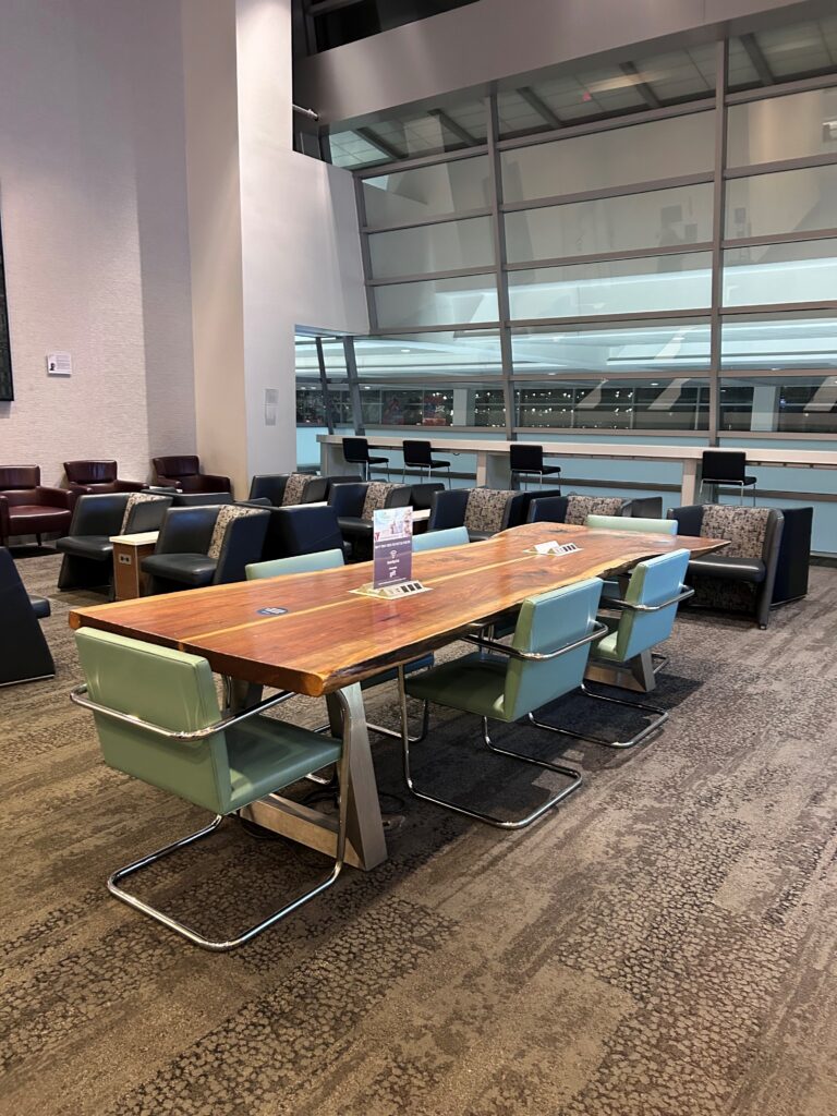 a room with a table and chairs