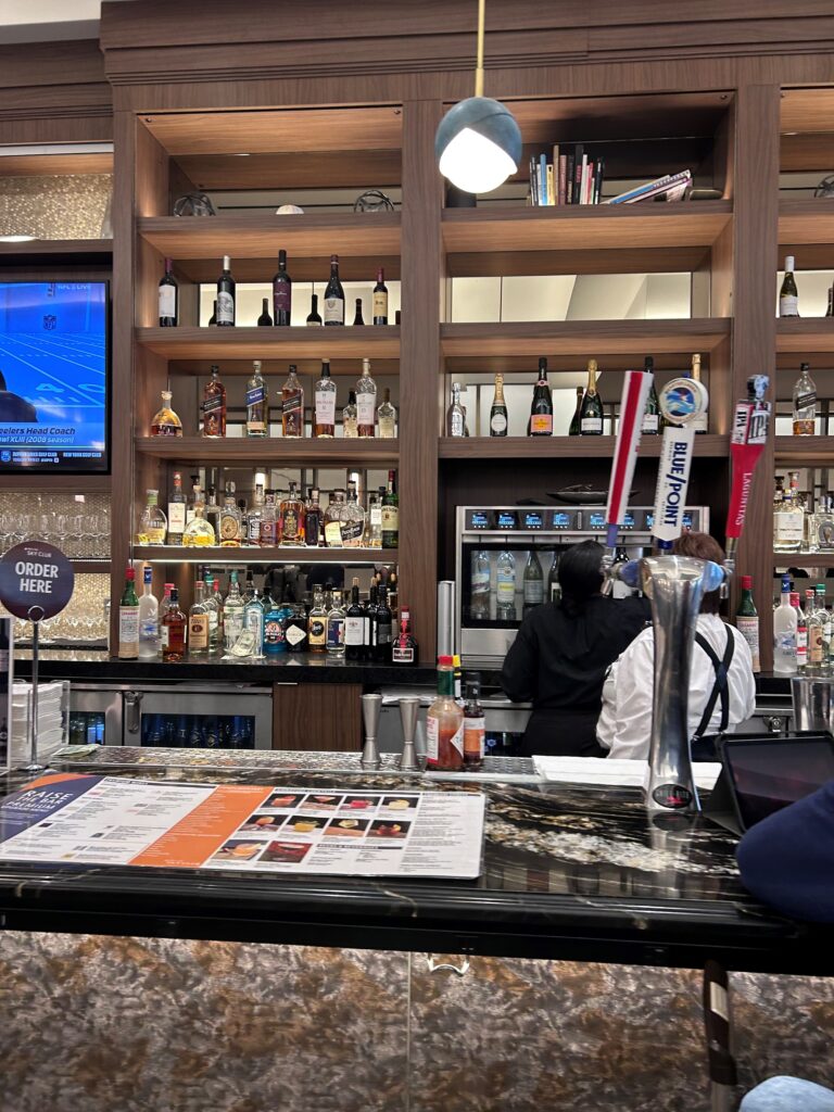 a bar with bottles of alcohol