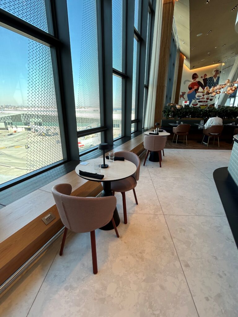 a room with tables and chairs