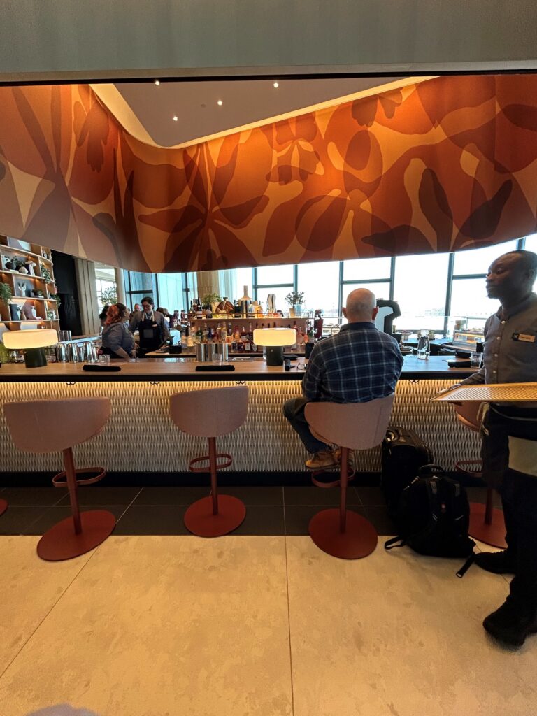 people sitting at a bar