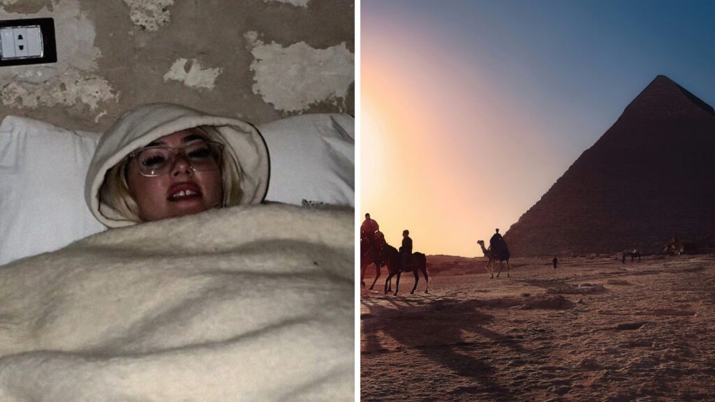 a woman lying in a blanket and a pyramid