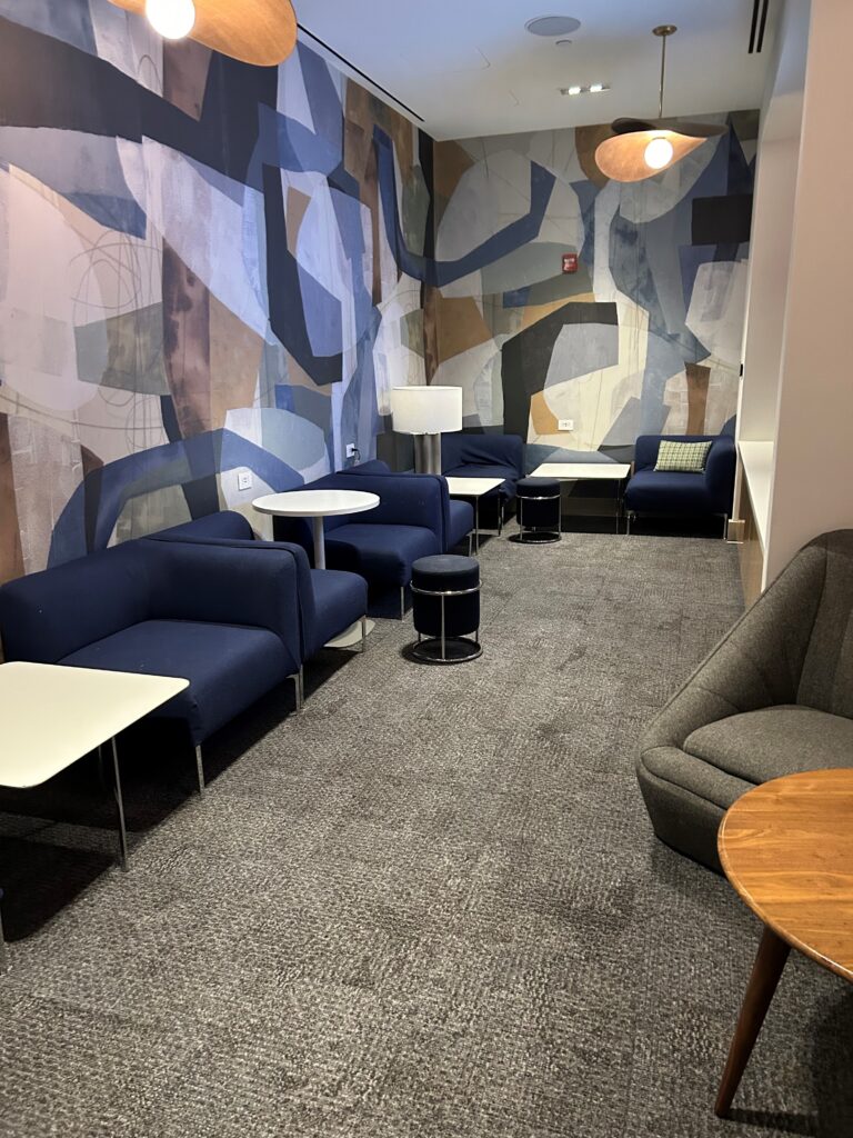 a room with chairs and tables