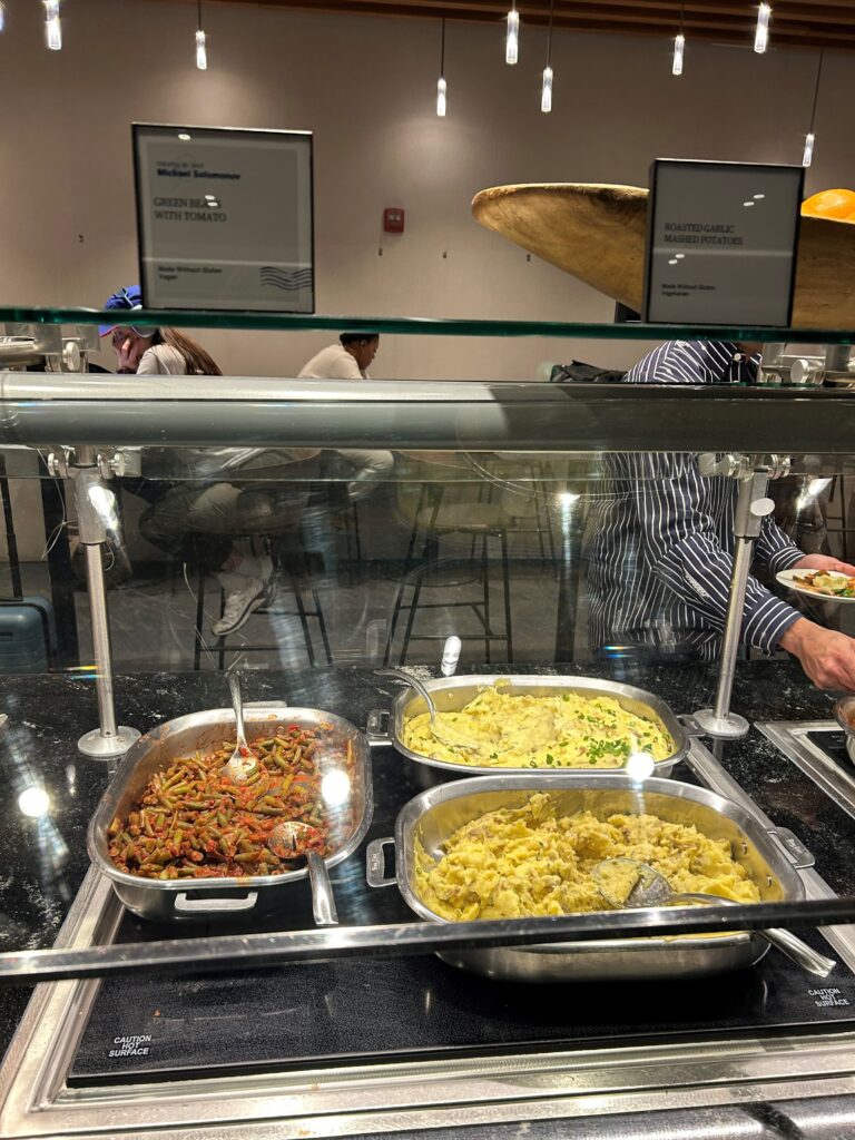 a buffet with food in containers