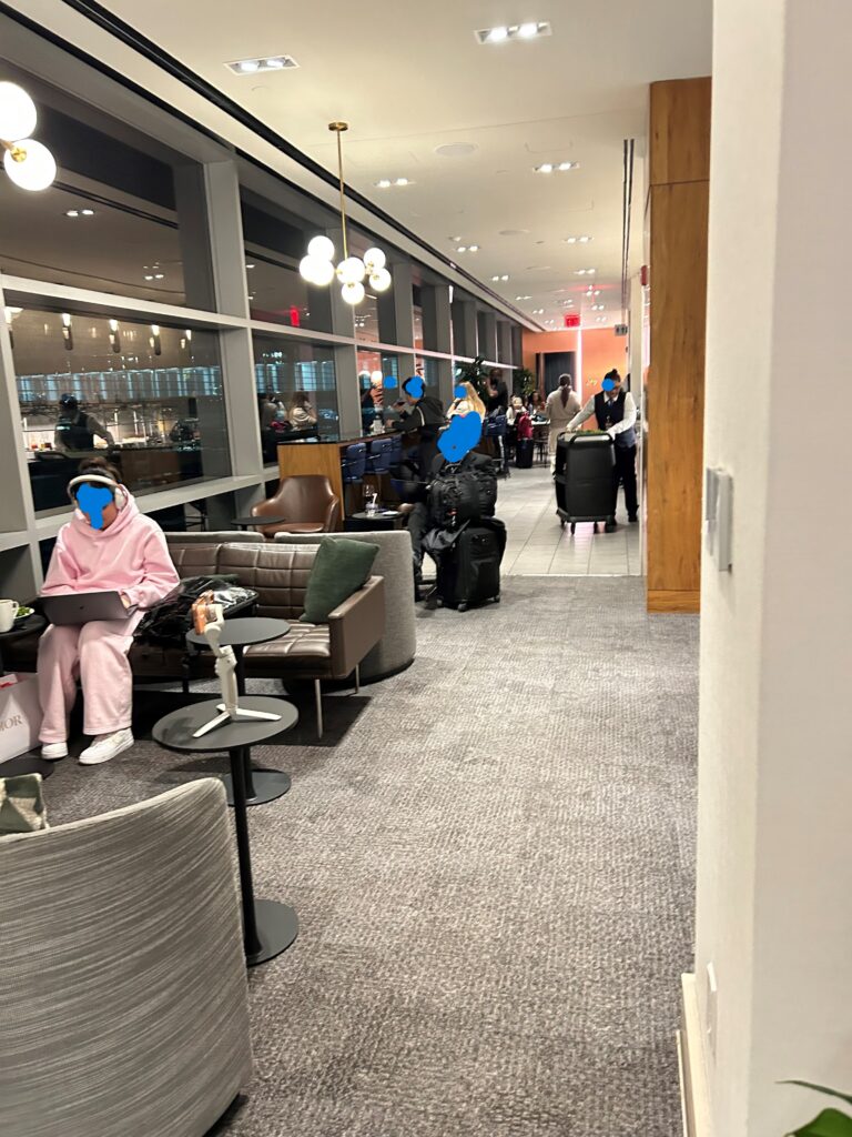 people in a room with luggage