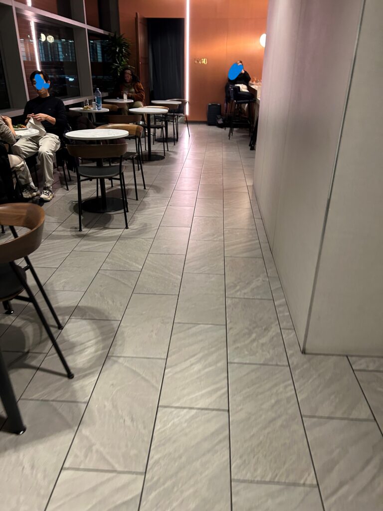 a group of people sitting at tables in a room