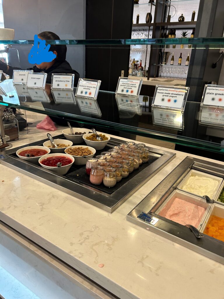 a buffet with different food items on it