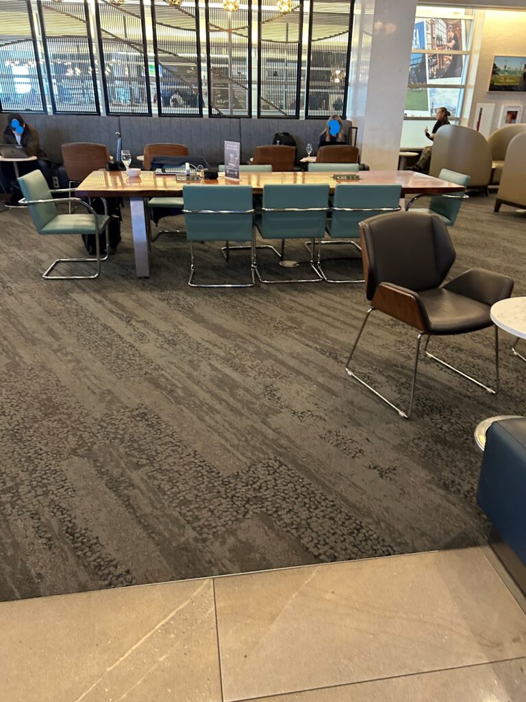 a large table with chairs in a room