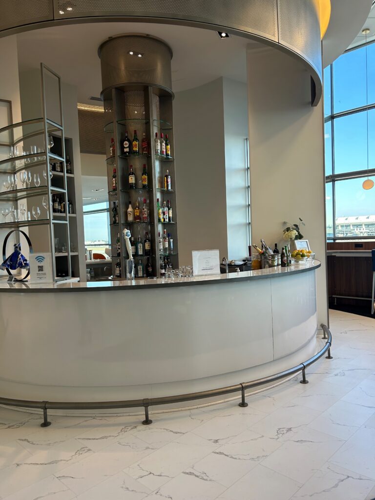 a bar with bottles of alcohol on it