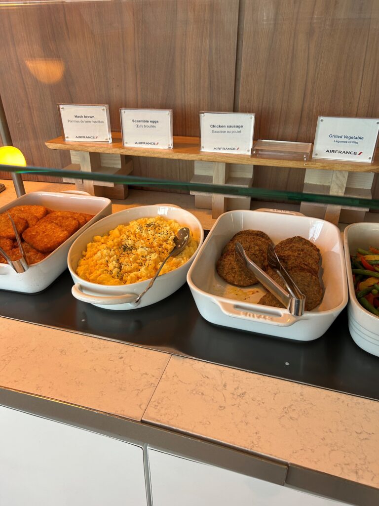 a buffet table with food in bowls