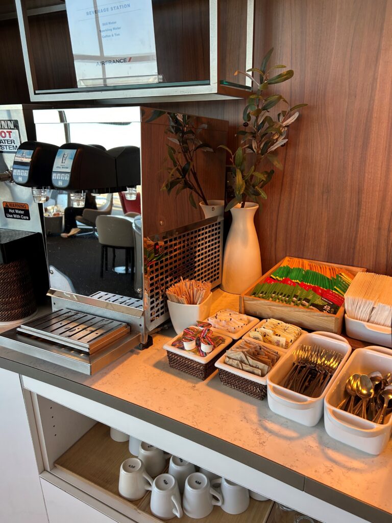 a counter with a variety of utensils and a mirror