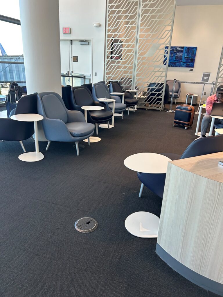 a room with chairs and tables