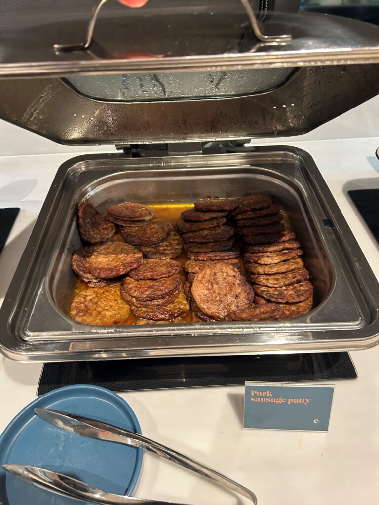 a tray of meat patties