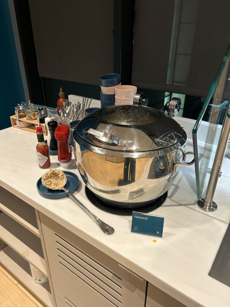 a large silver pot on a white counter