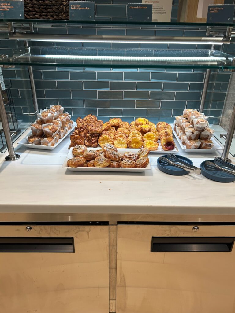 a trays of pastries on a counter