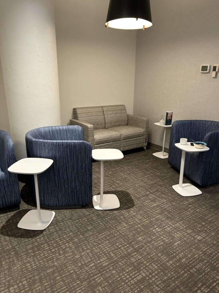 a room with chairs and tables