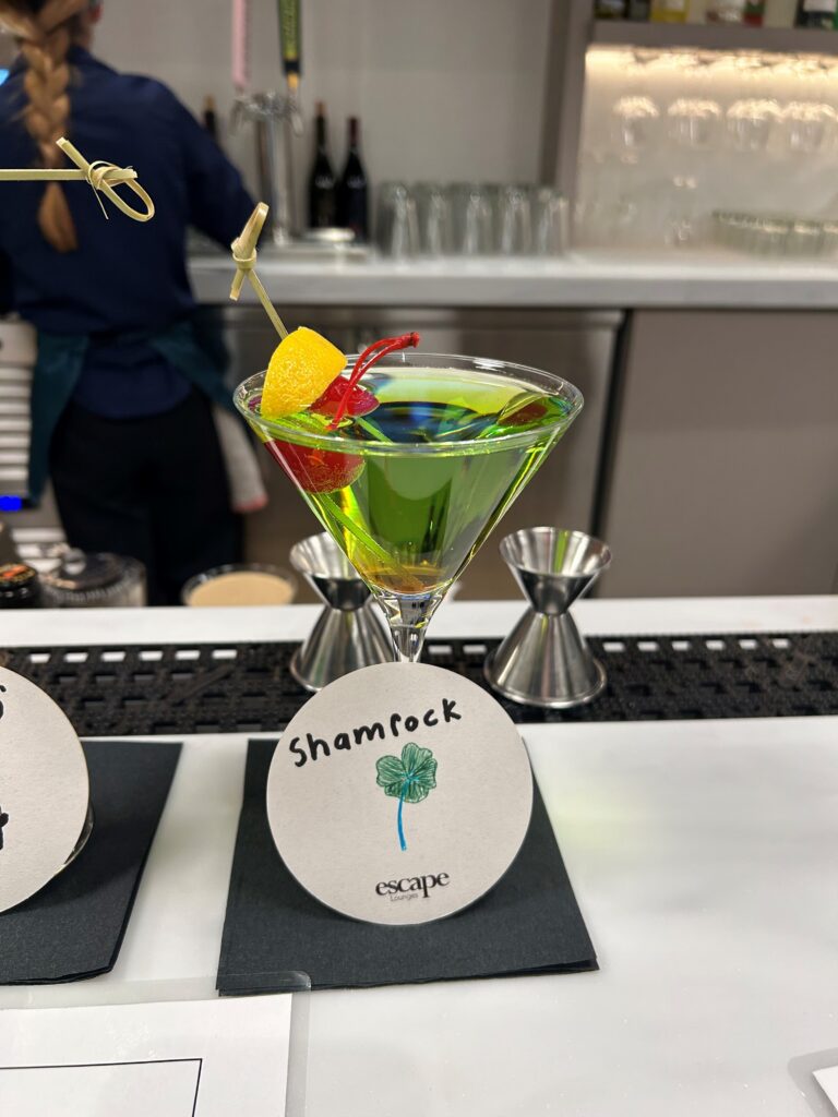 a glass with a drink in it