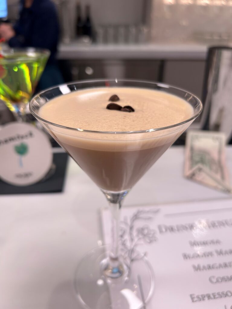 a glass with a drink in it