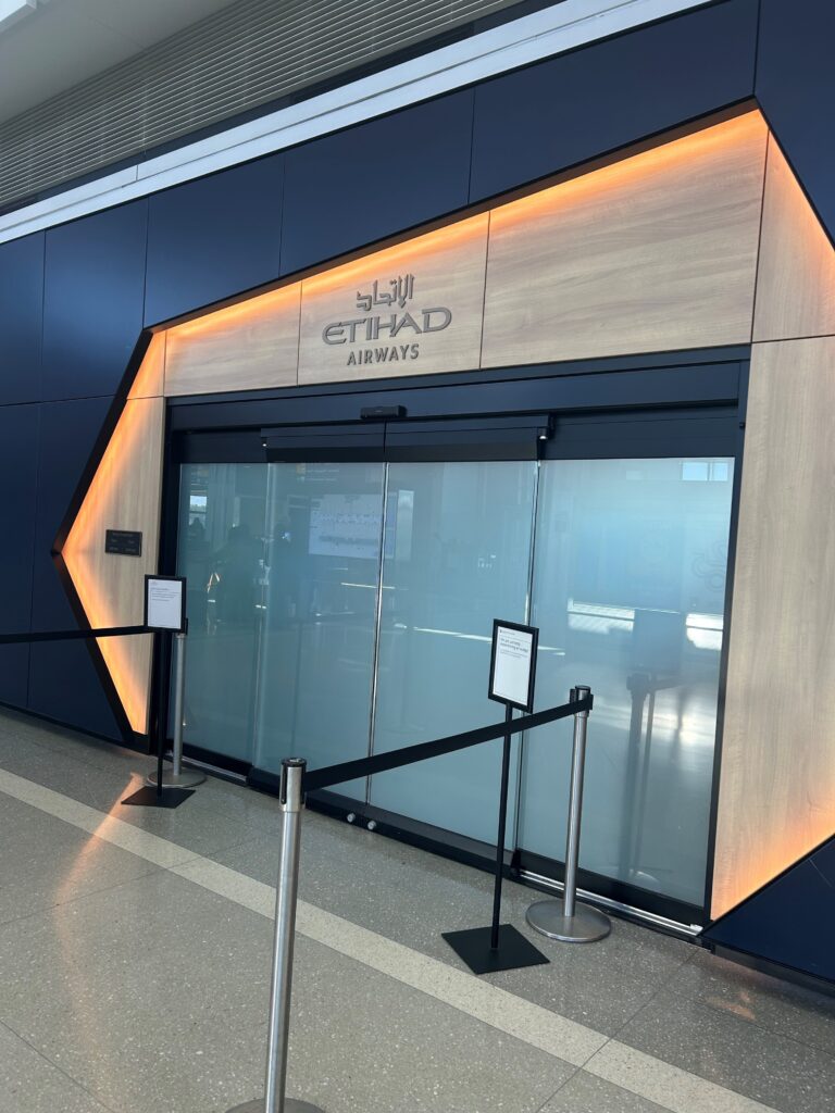 a glass door with a sign on it
