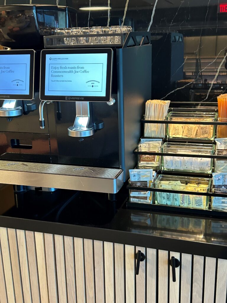 a coffee machine with a few screens