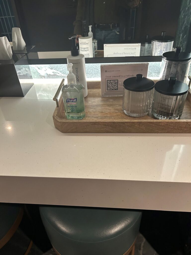 a tray of soap and lotion on a counter