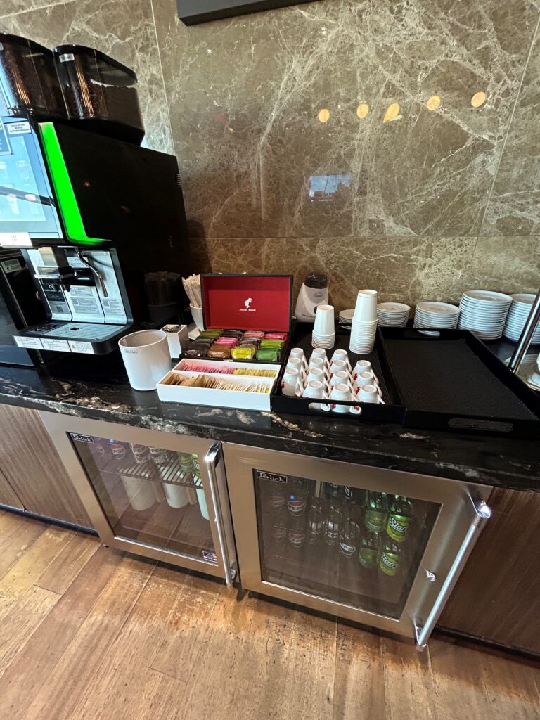 a counter with a variety of coffee items on it